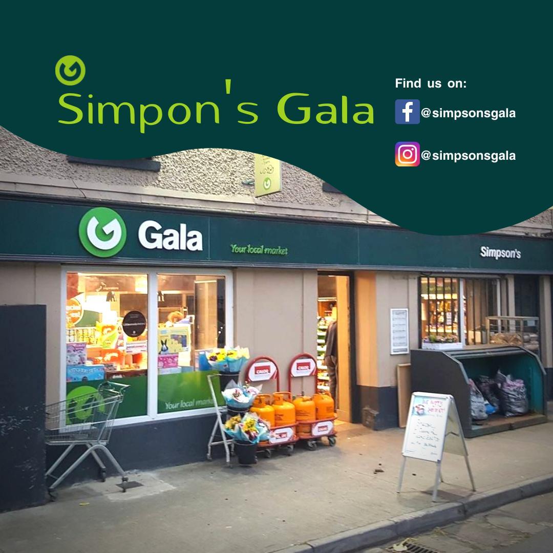 Simpson's Gala shopfront on Main Street with Gala signage, flowers, gas cylinders and a shopping trolley outside
